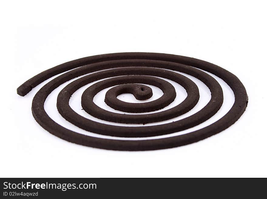 A burning mosquito repellent incense with white background