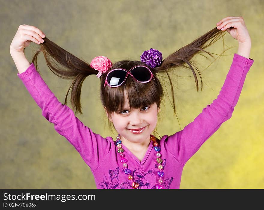 Portrait of young happy girl with ponytails. Portrait of young happy girl with ponytails