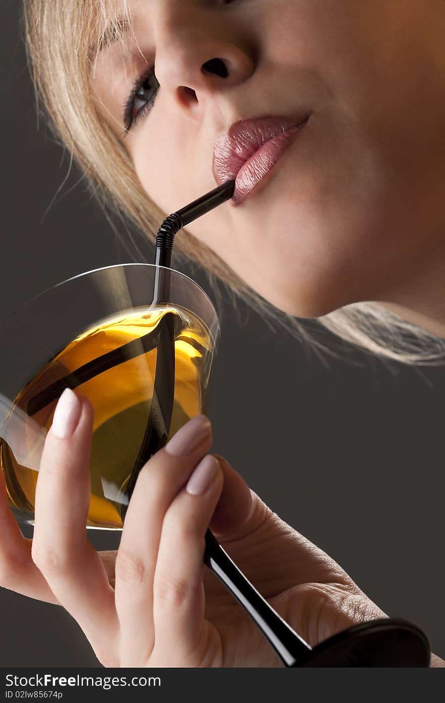 Woman with glass of cocktail