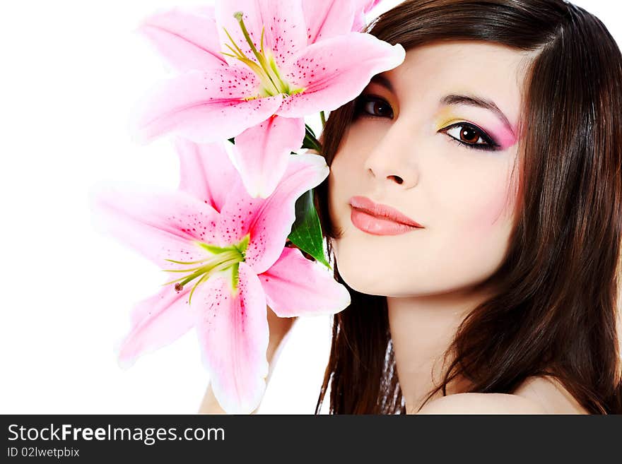 Shot of a young beautiful woman with a lily flowers. Isolated over white background. Shot of a young beautiful woman with a lily flowers. Isolated over white background.