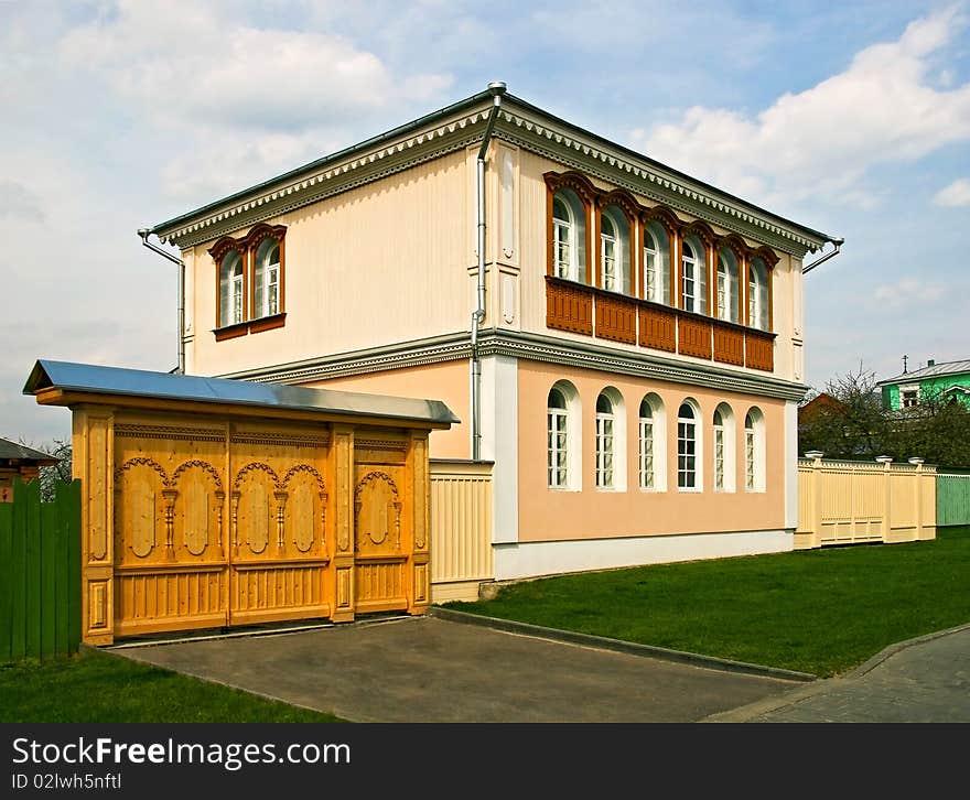 The beautiful house and wooden gates