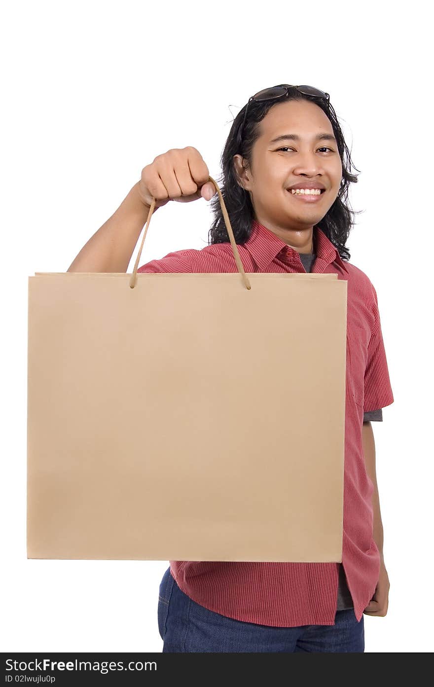 Long hair man with paper bag isolated on white background