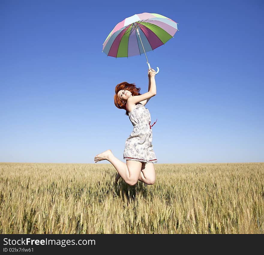 GIrl With Umbrella At Field