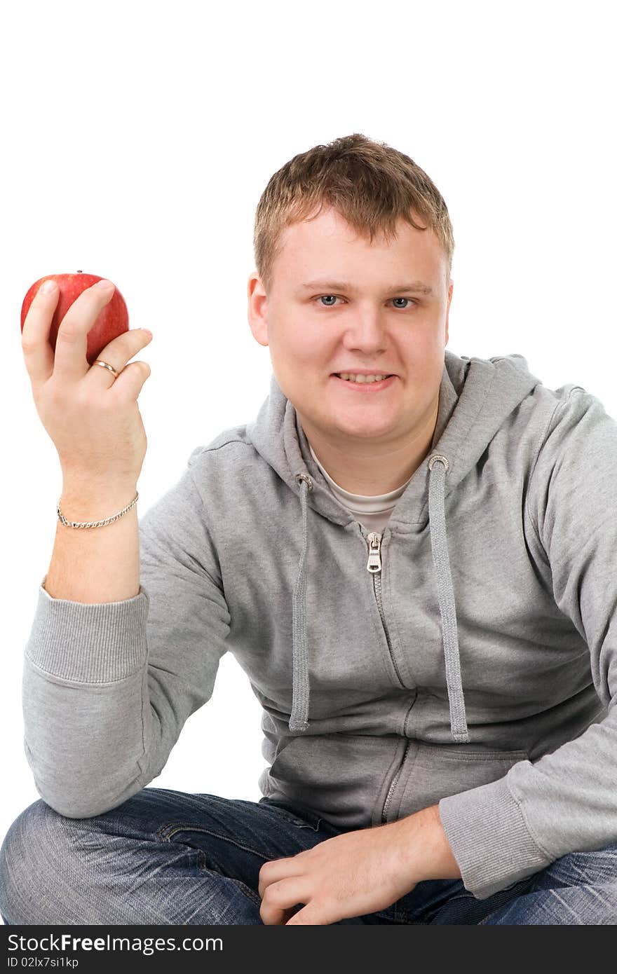 Young man with apple