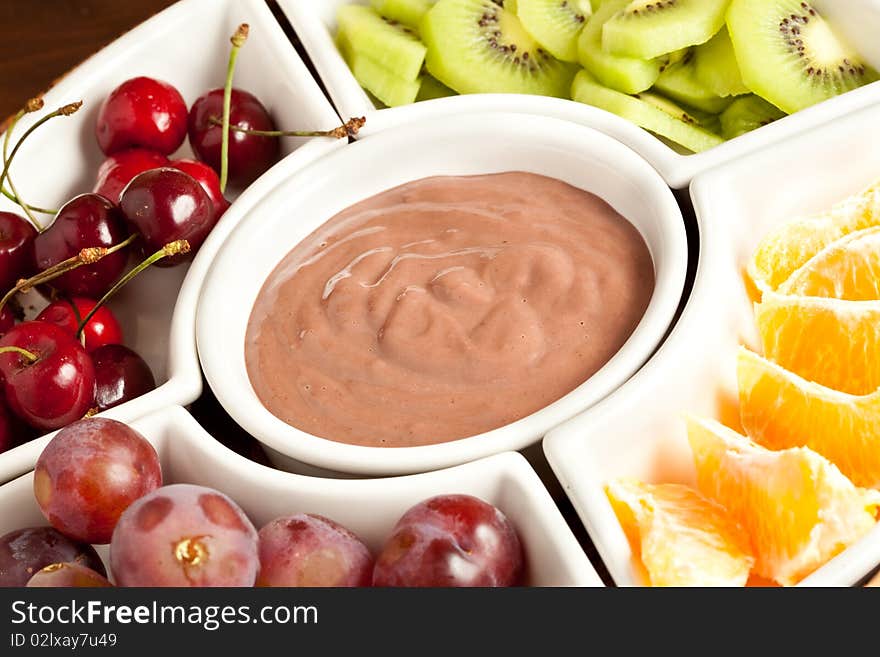 Closeup of a plate with different fruits. Closeup of a plate with different fruits