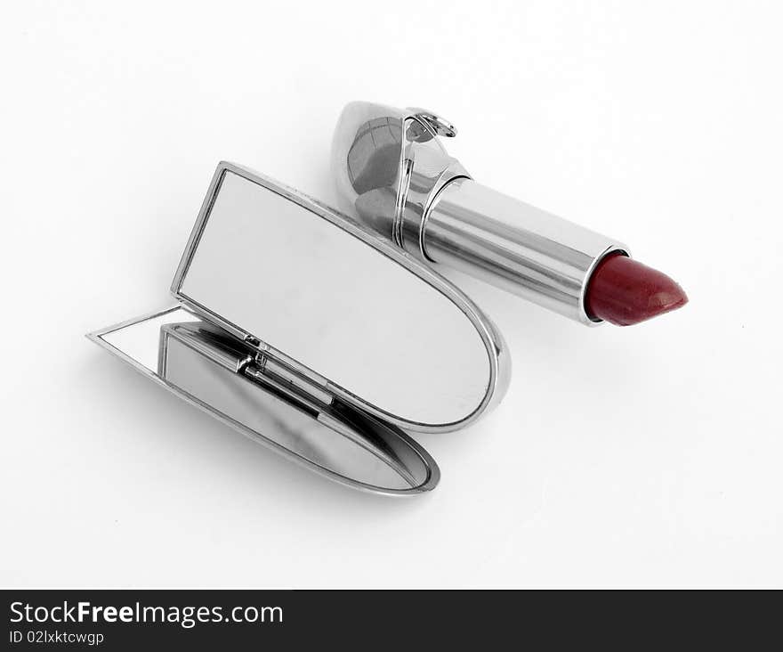 Female red lipstick on a white background. Female red lipstick on a white background