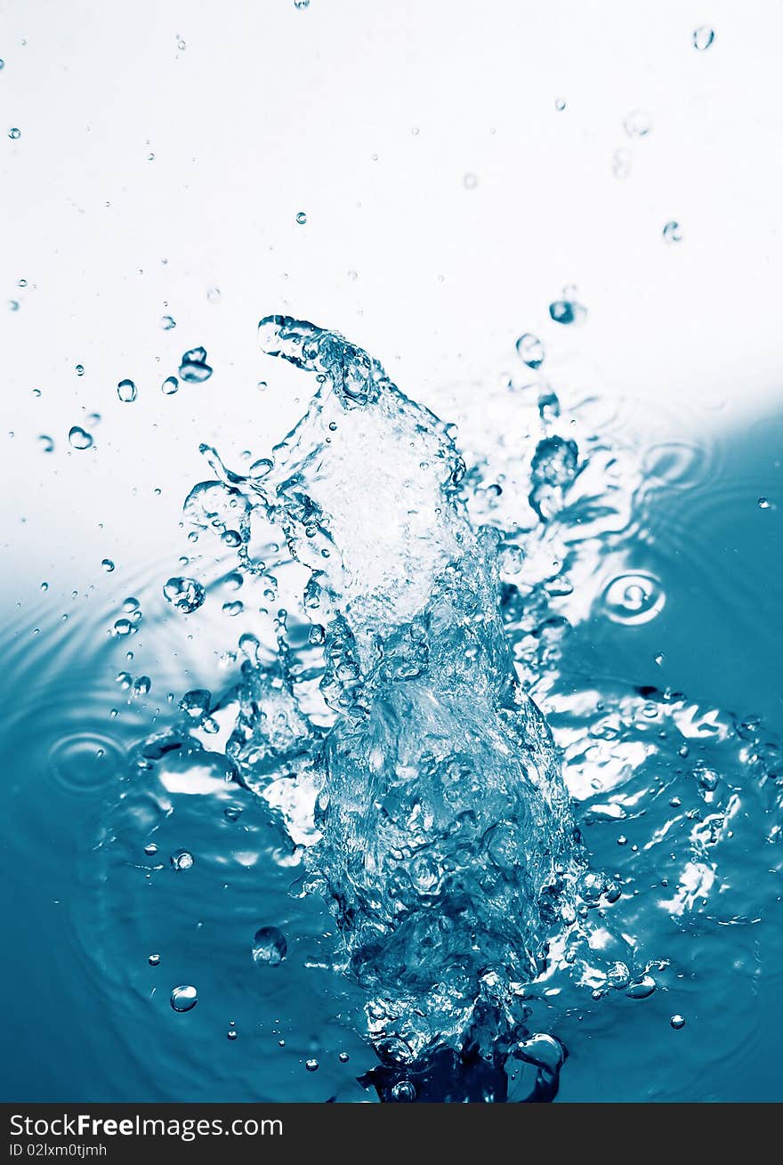 Wave and bubbles in a glass aquarium