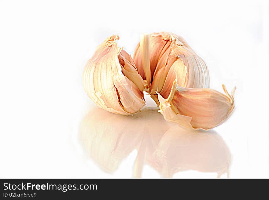 Head of garlic on isolated white background