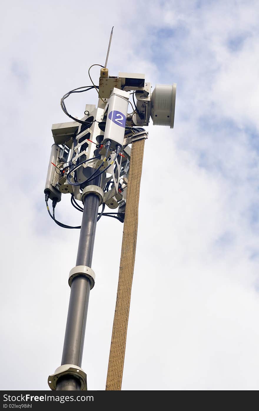 Lifting antenna on a truck, parking at a Meeting place for a large number of people