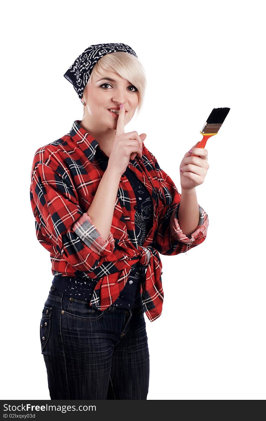 Charming blonde painter in a red shirt and blue scarf