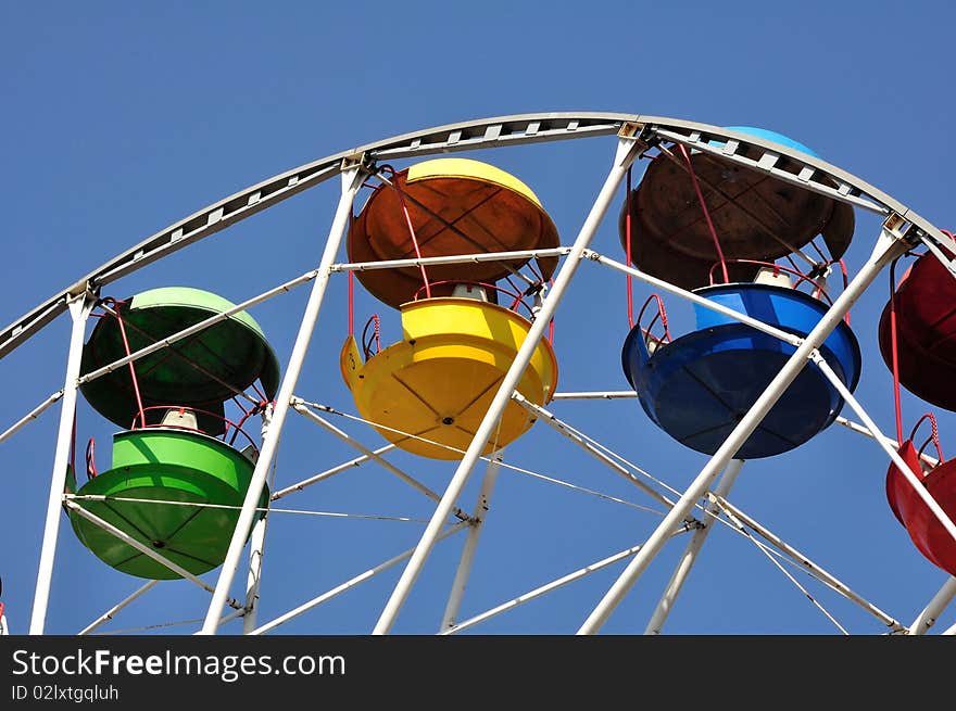 Ferris wheel against the sky. Ferris wheel against the sky.