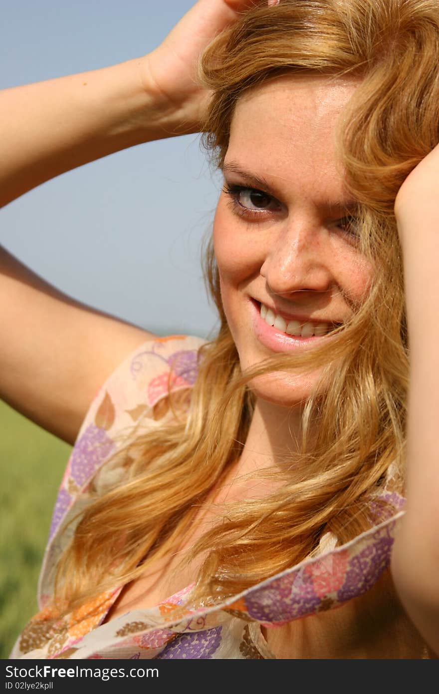 Sexy girl in a wheat field