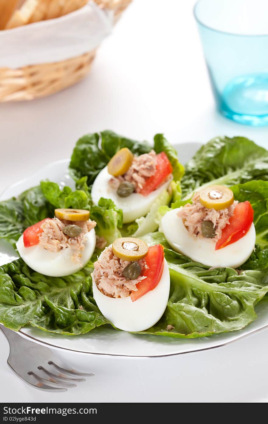 Salad plate of letuce egg tuna and olive. Salad plate of letuce egg tuna and olive