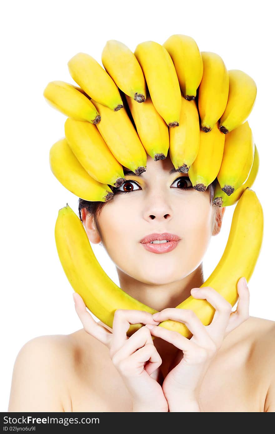 Shot of a beautiful young woman with fruits headwear. Food concept, healthcare. Shot of a beautiful young woman with fruits headwear. Food concept, healthcare.