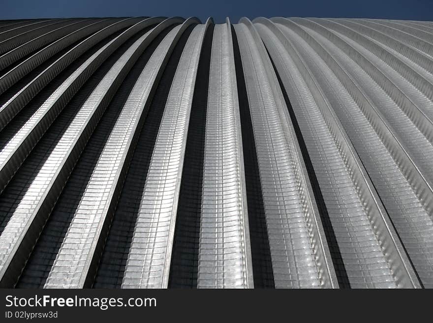 Industrial background from bent metallic a sheet. Industrial background from bent metallic a sheet