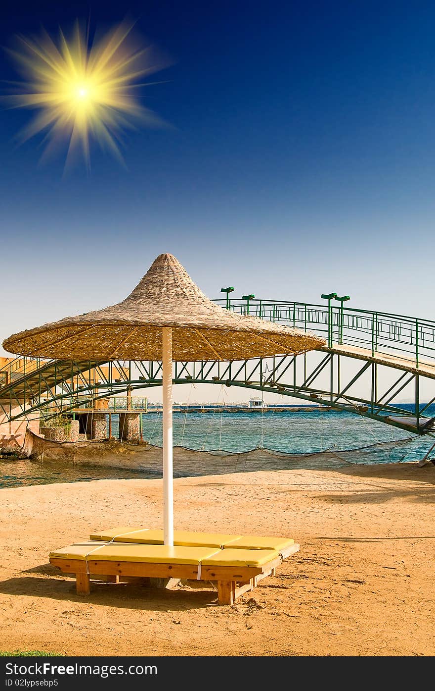 Alone parasol next to the bridge. Alone parasol next to the bridge.