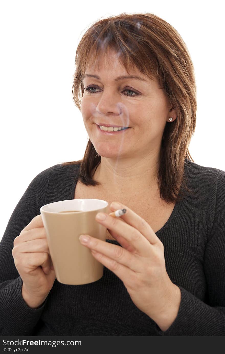 Woman with coffee and cigarette