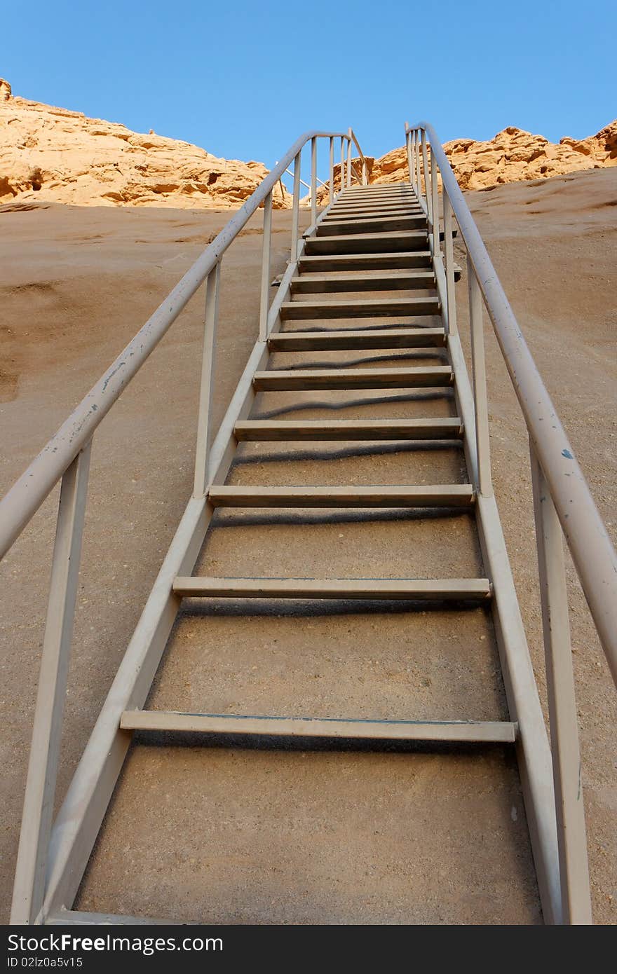 Staircase to yellow mountain in the desert outdoor. Staircase to yellow mountain in the desert outdoor