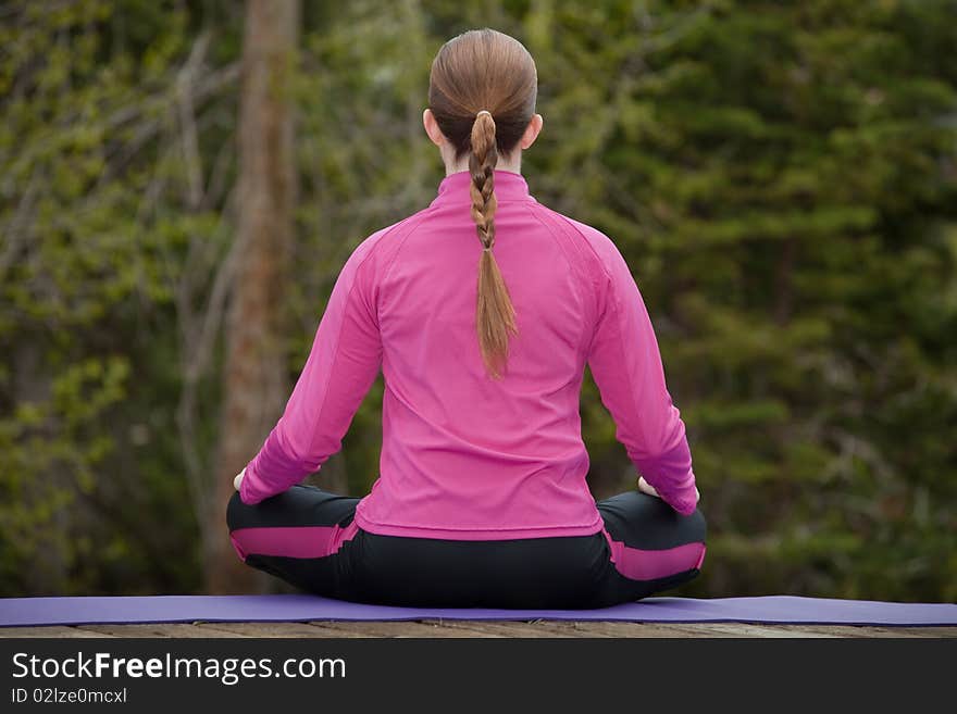 Woman meditating in nature