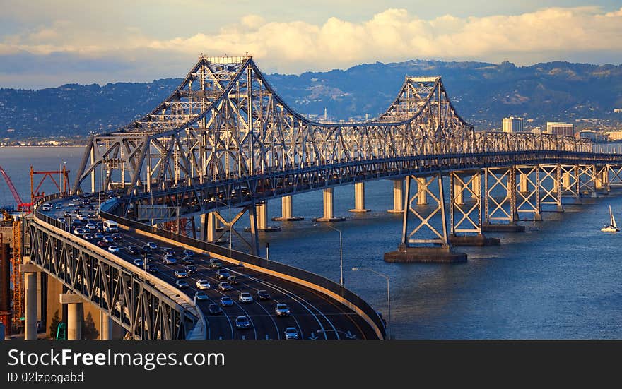 Bay Bridge in late afternoon light seen from Treasure Island.