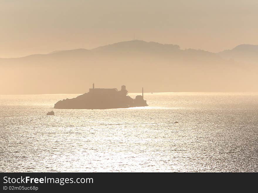 Alcatraz island at golden sunset.view from treasure island. Alcatraz island at golden sunset.view from treasure island