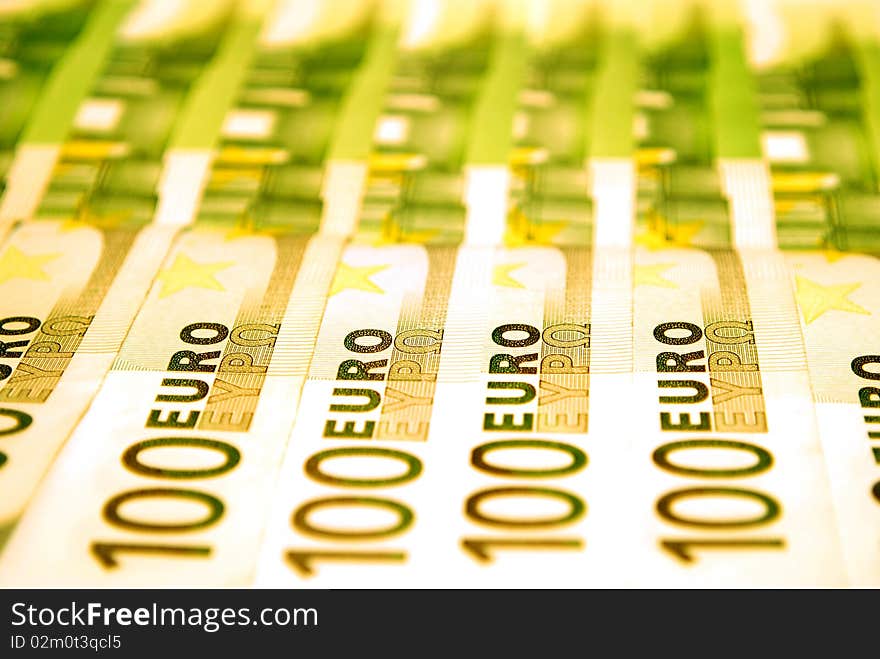 Many 100 Euro Banknotes standing in a raw. Many 100 Euro Banknotes standing in a raw