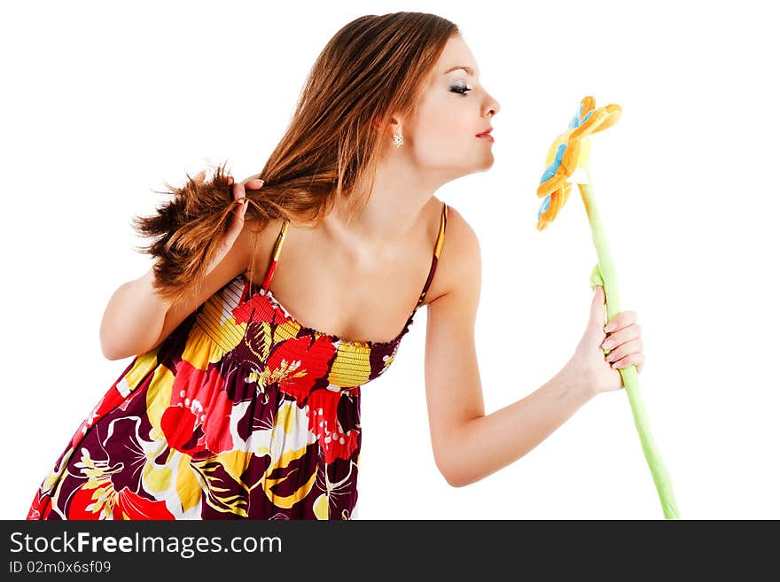 Beautiful charming young girl with flower