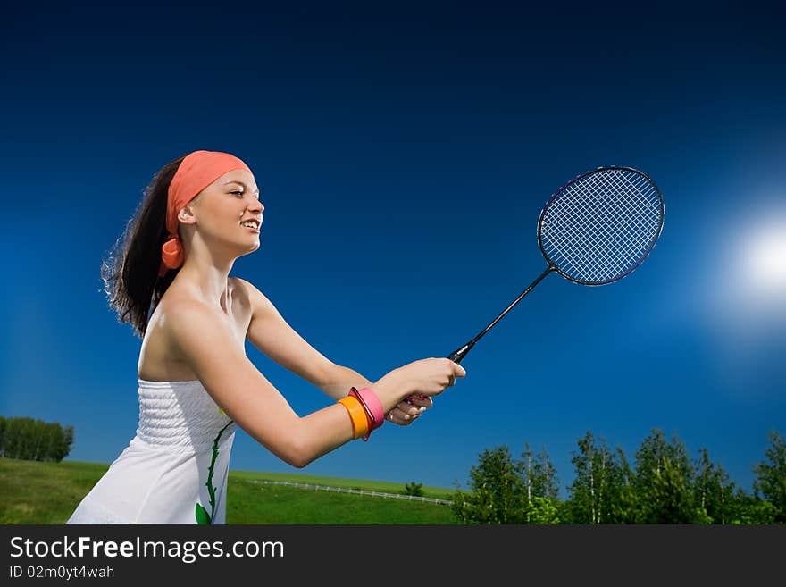 Beautiful girl in kerchief with racket. Beautiful girl in kerchief with racket