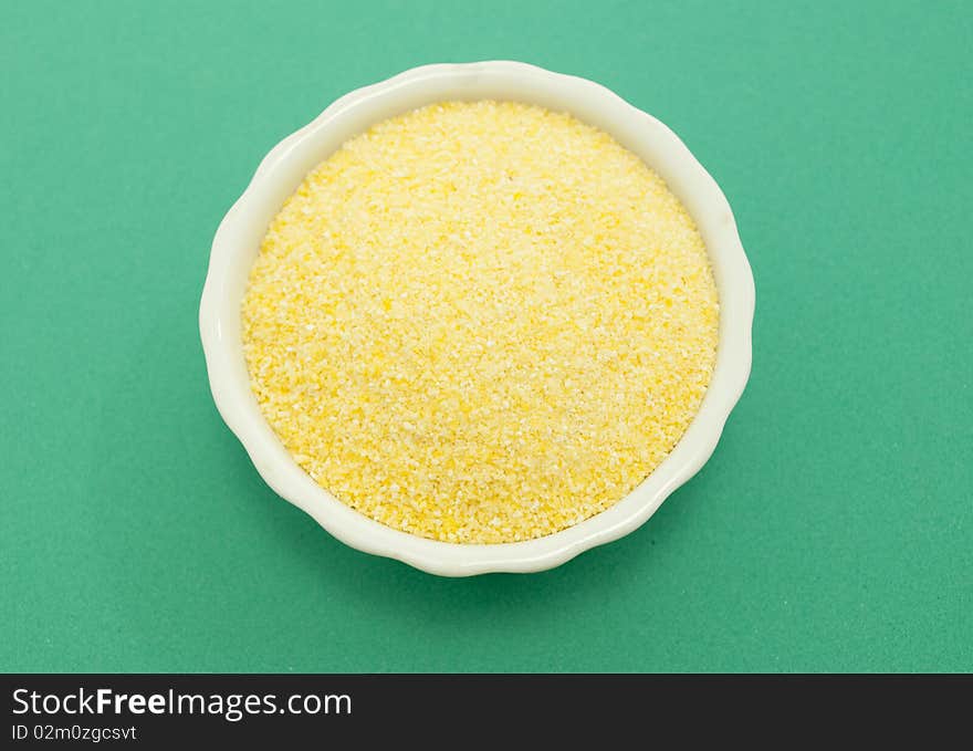 Cornmeal macro photography close-green background