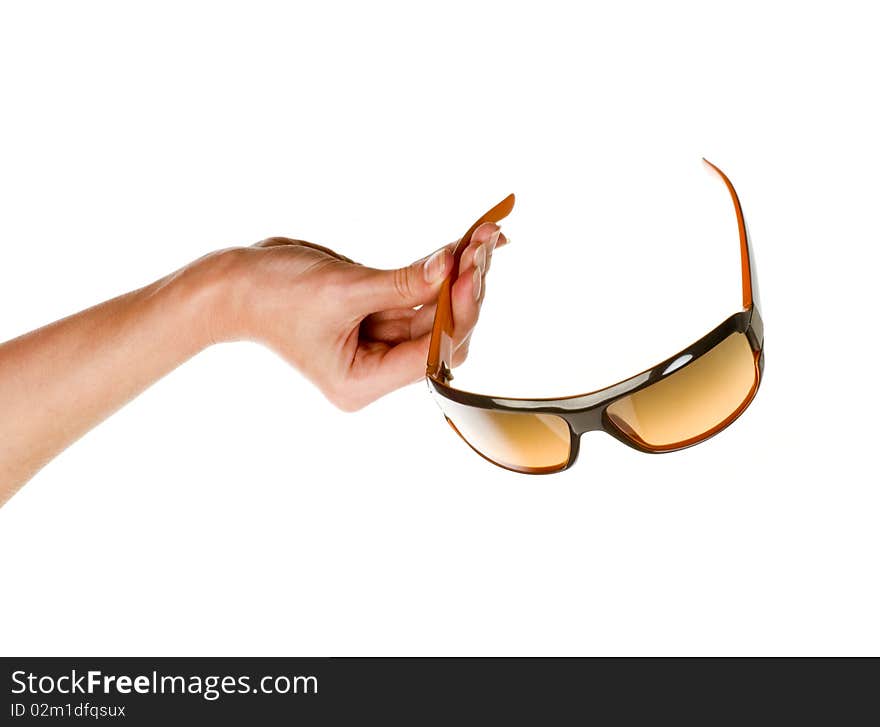 Sunglasses in hand isolated