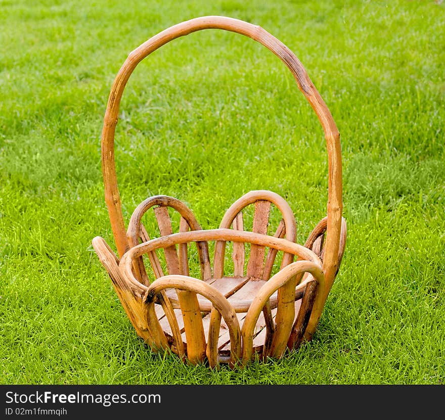 Wooden  basket on a grass