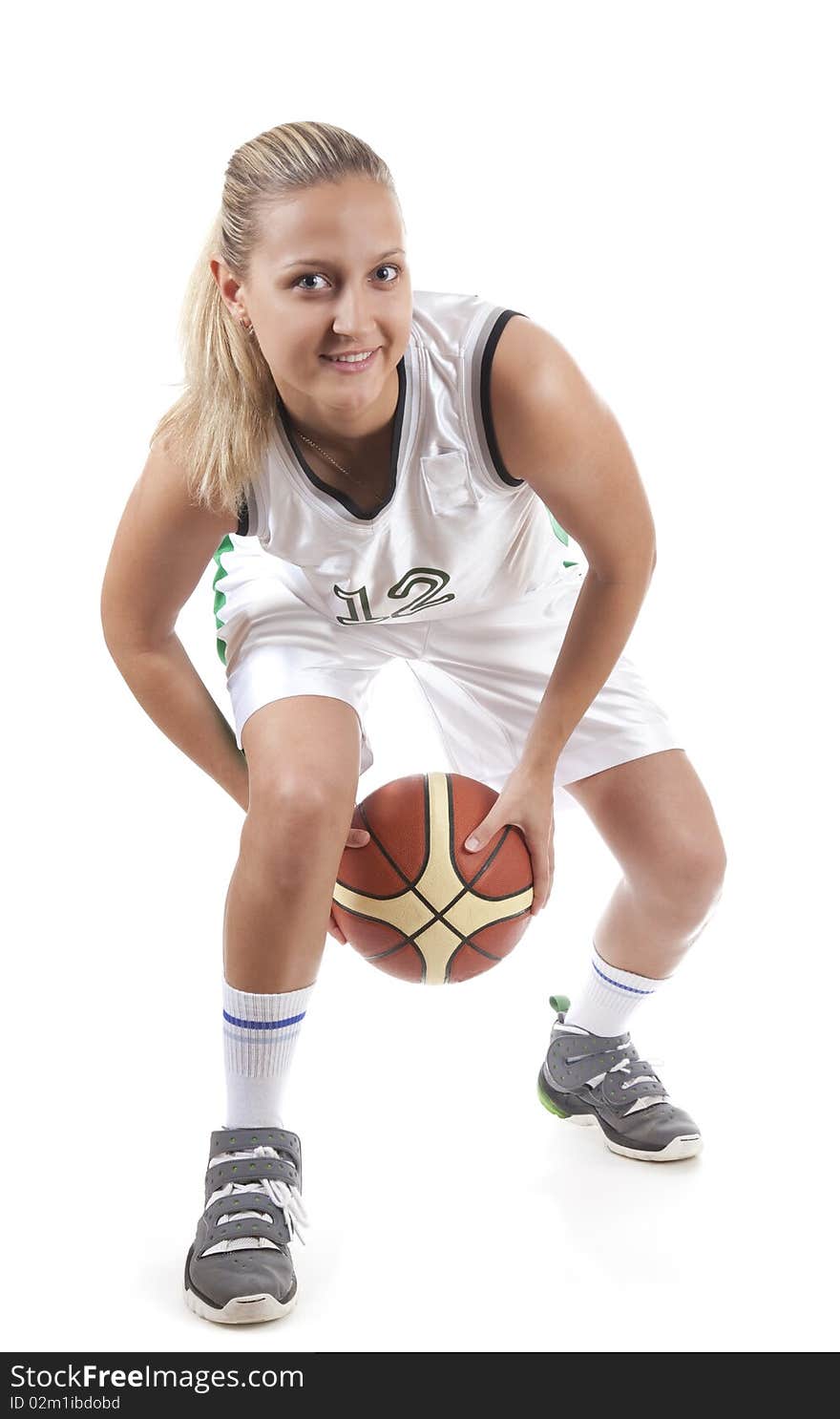 Active female basketball player, isolated on white background