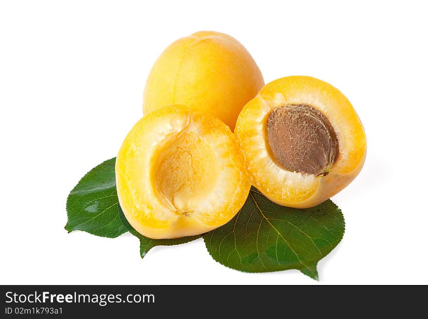 Fresh juicy apricots on white background