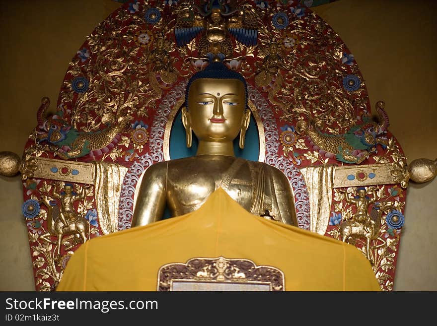 Buddha Statue in an ancient buddhist temple in the indian himalayas