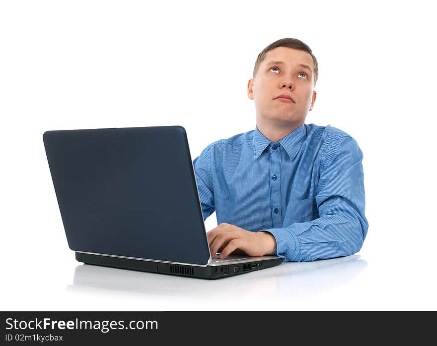 Young man working on his laptop computer