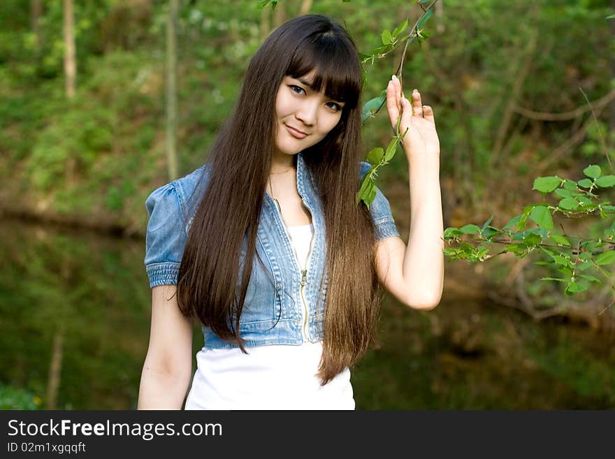 Girl walking in summer park. Girl walking in summer park