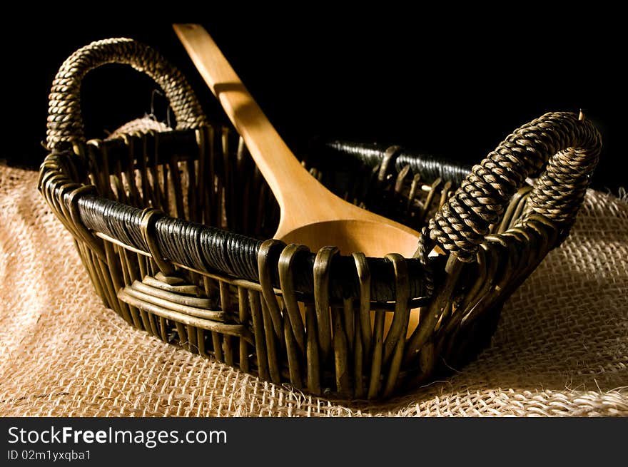 Basket and wooden spoon