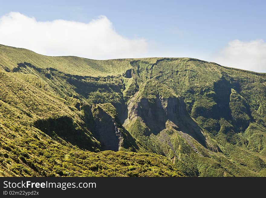 Steep cliffs of volcano in Faial, Azores