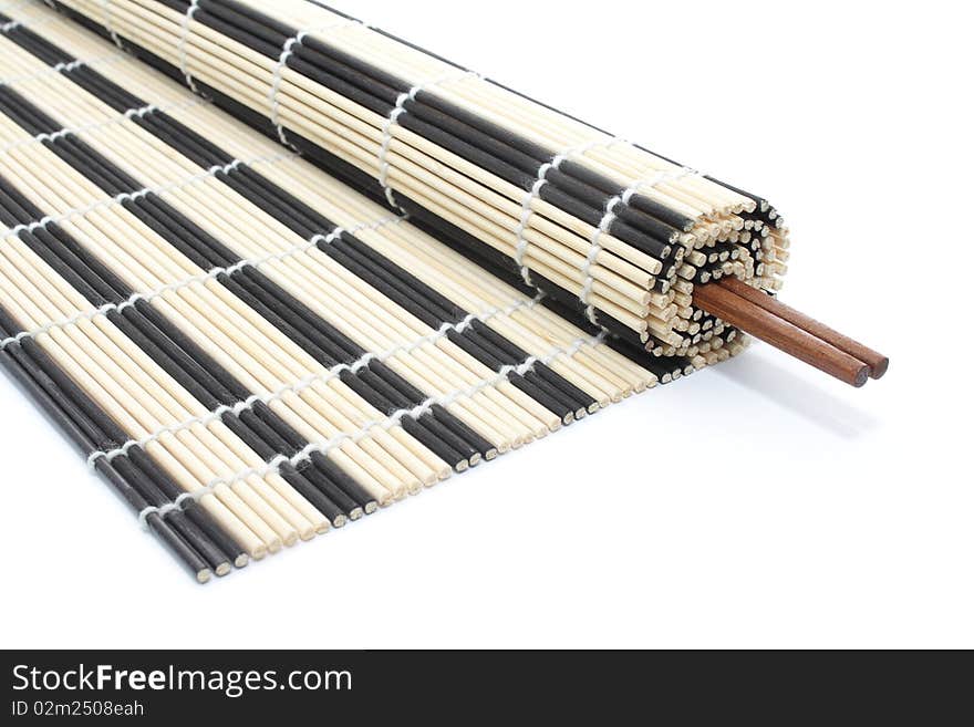 Half-rolled bamboo mat with chopsticks