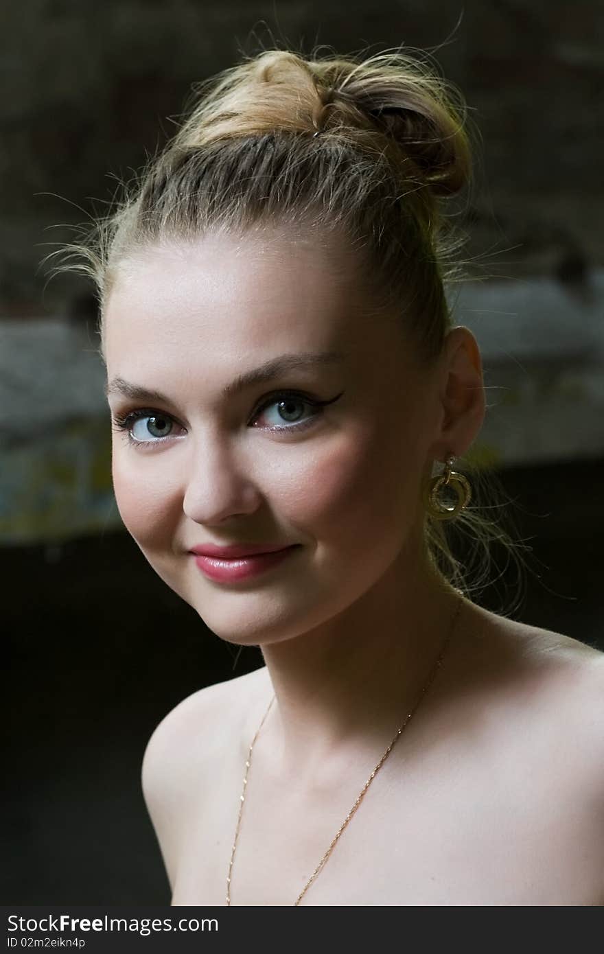 Portrait of beautiful white woman in ruins