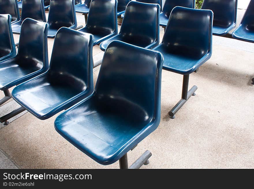 The blue chairs on the floor , pattern blue chairs