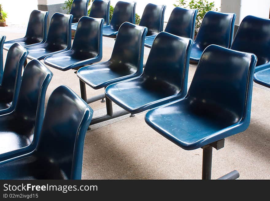 The blue chairs on the floor , pattern blue chairs