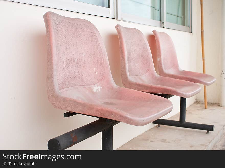 The gray chairs on the floor , pattern blue chairs