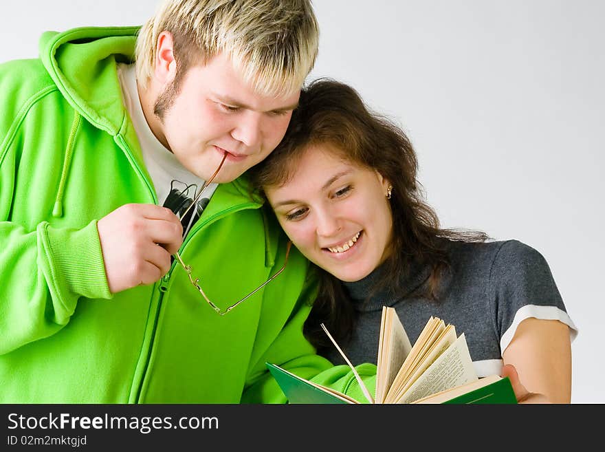 Girl And Guy With A Book