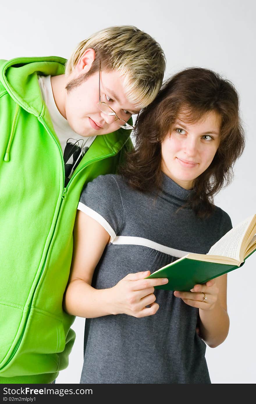 Girl And Guy With A Book