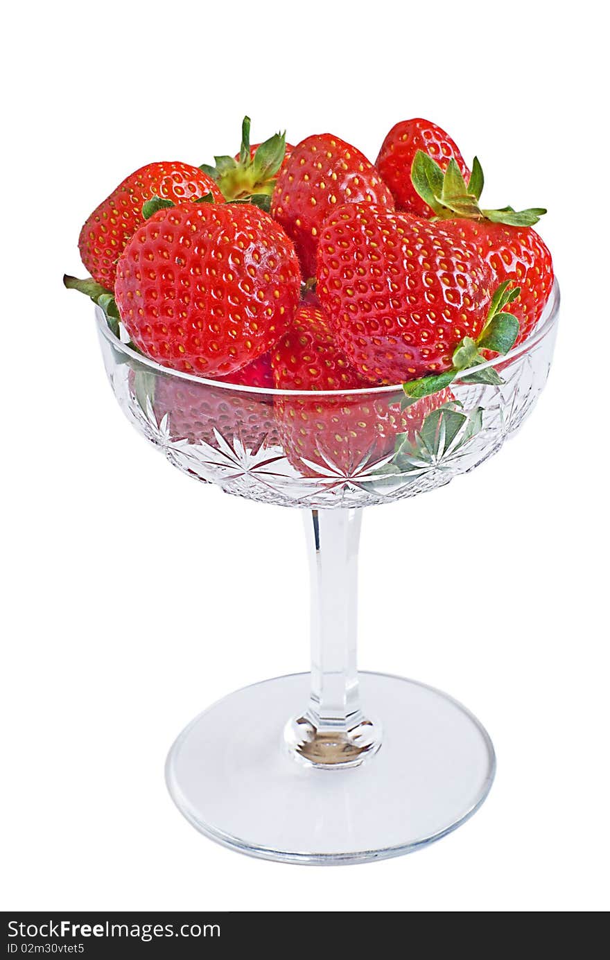 Strawberry on a plate on a white background. Strawberry on a plate on a white background