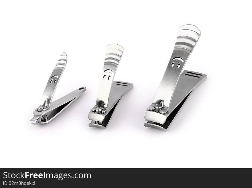 Nail clipper and Scissors Isolated On White with Clipping Path Due to technical reasons, clipping path is available only for the extra large size of this file.