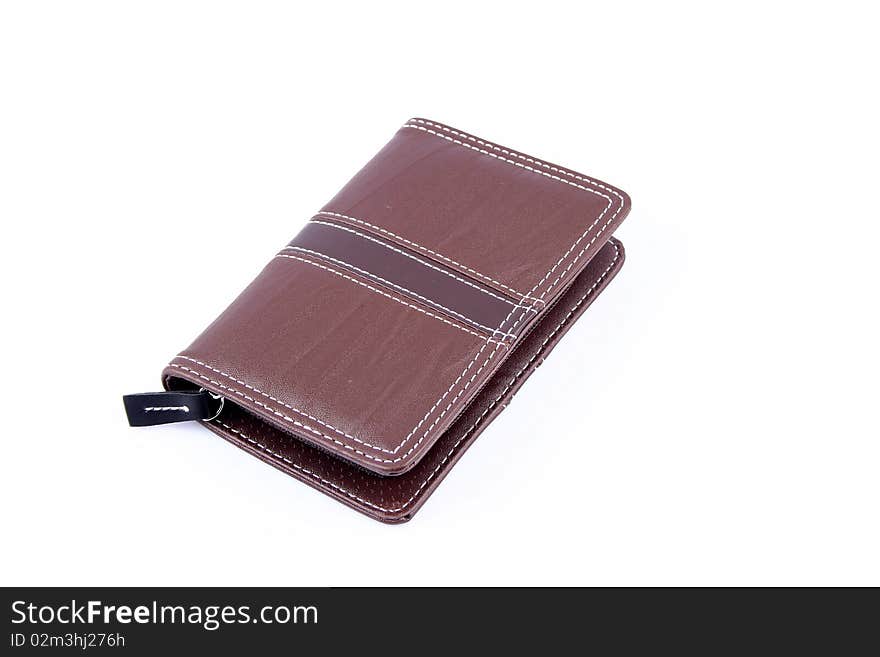 Lage isolated brown leather wallet on a white background