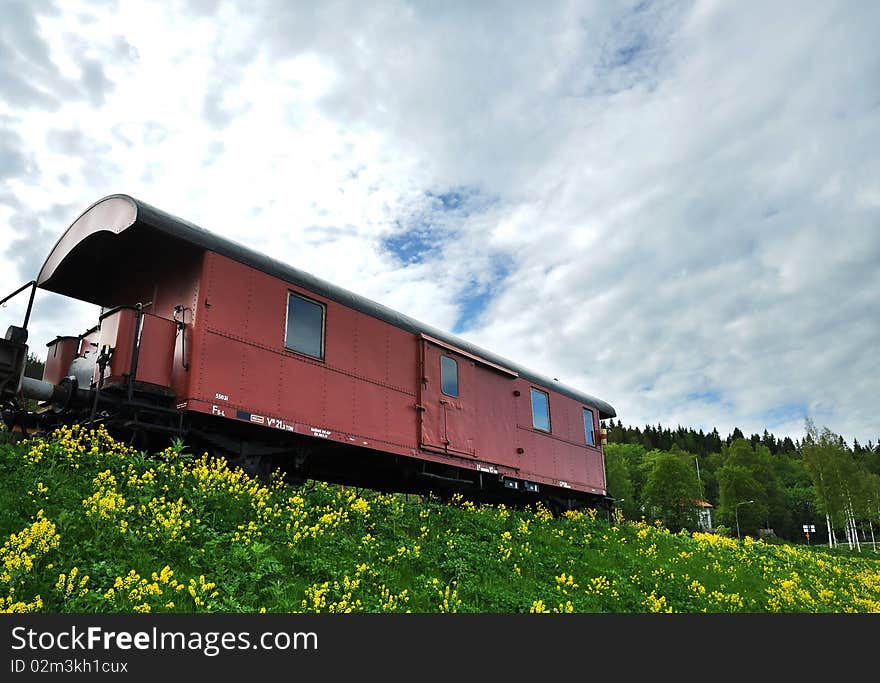 A freight train against blue sky.