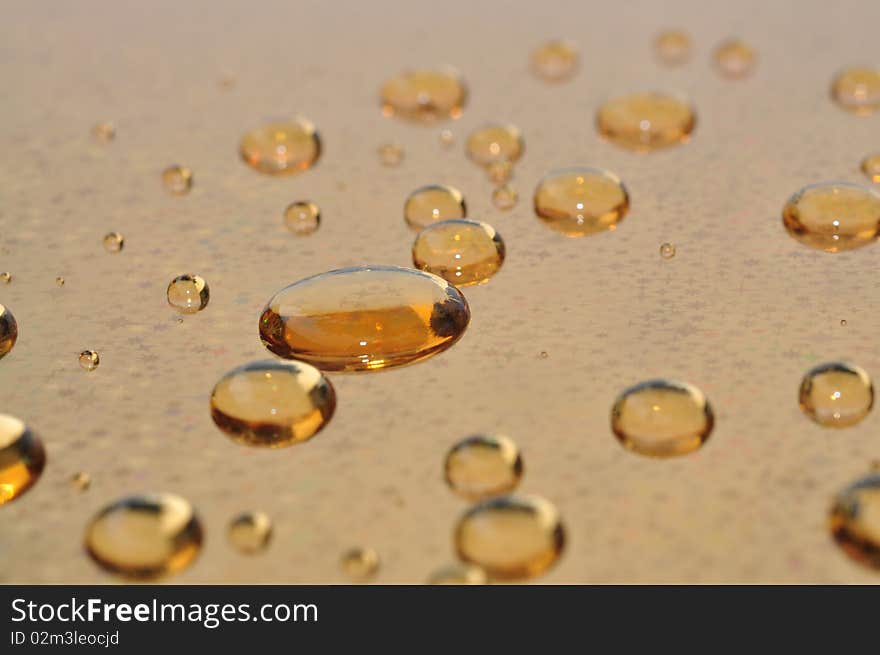 Background of water drops on gold foil paper. Background of water drops on gold foil paper